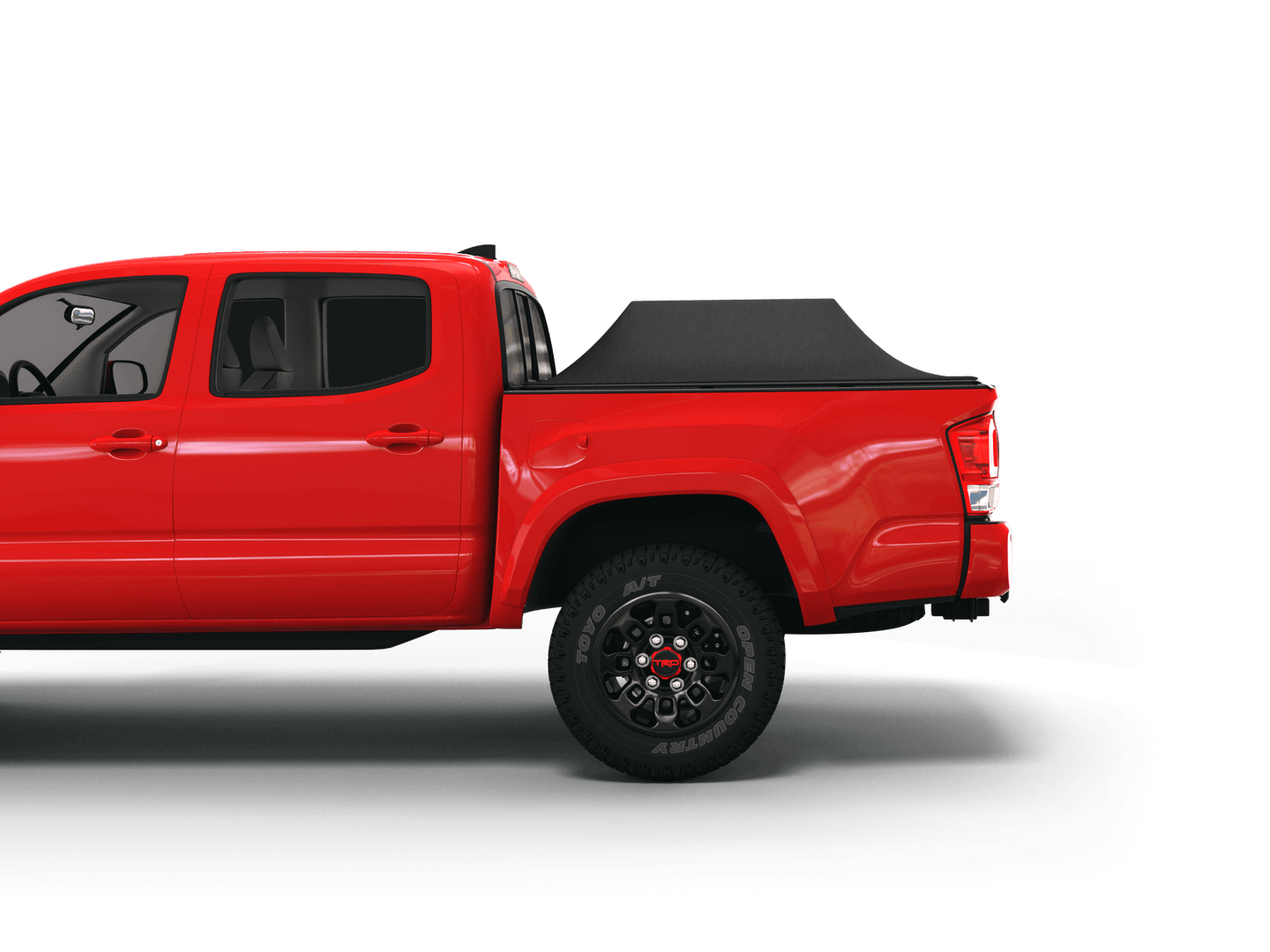 Red Toyota Tacoma with Sawtooth Stretch tonneau cover expanded over cargo load